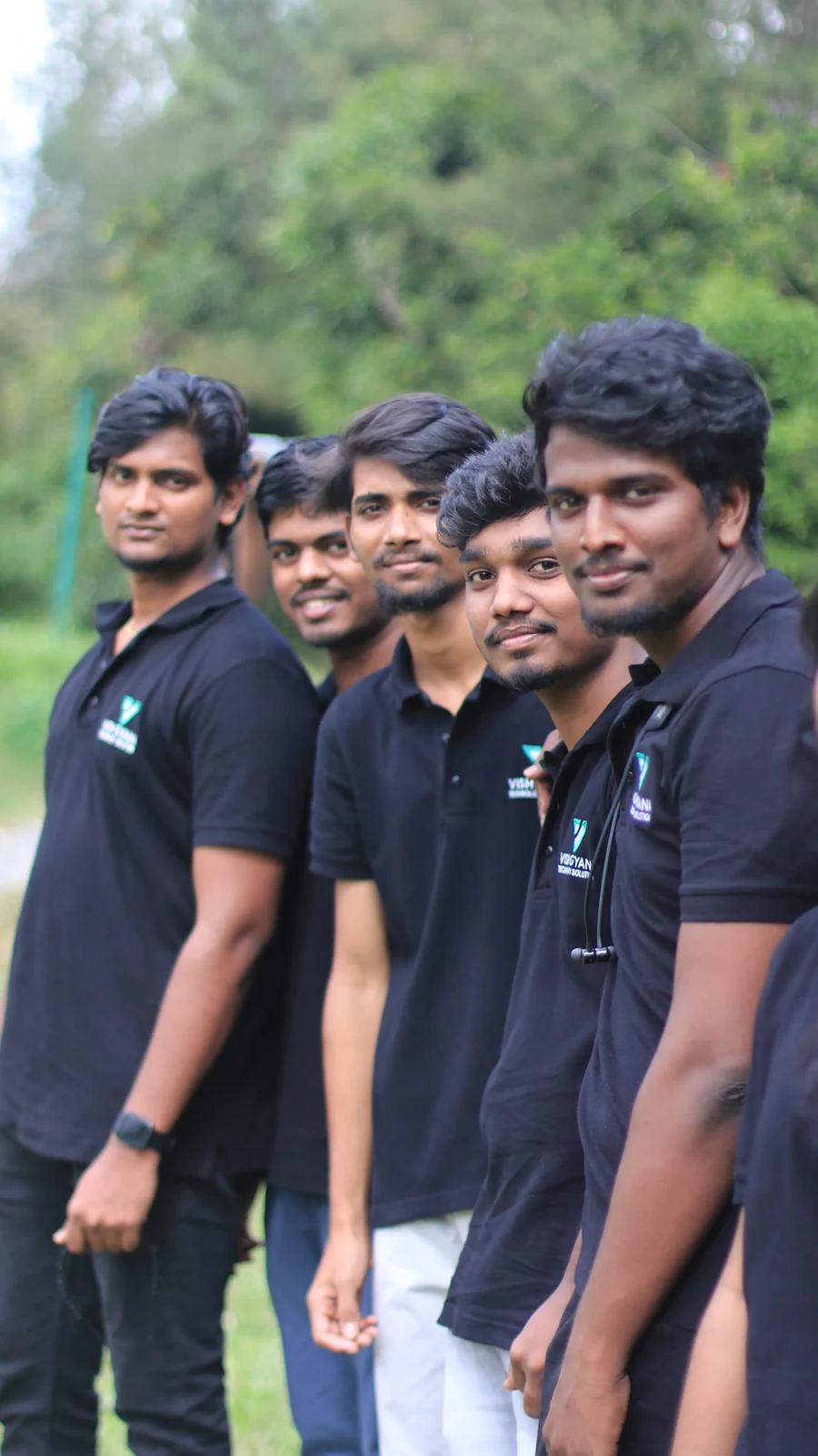 VGTS colleagues in company polo shirts outdoors