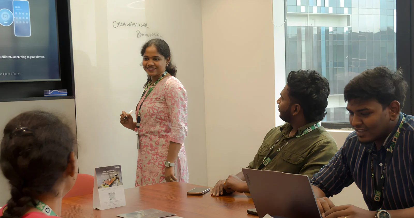 VGTS colleagues taking part in a workshop with a standing presenter